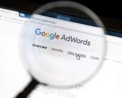 Google Adwords website under a magnifying glass